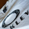 DSC04215 Oakley Distressed Logo Graphic T-Shirt – White